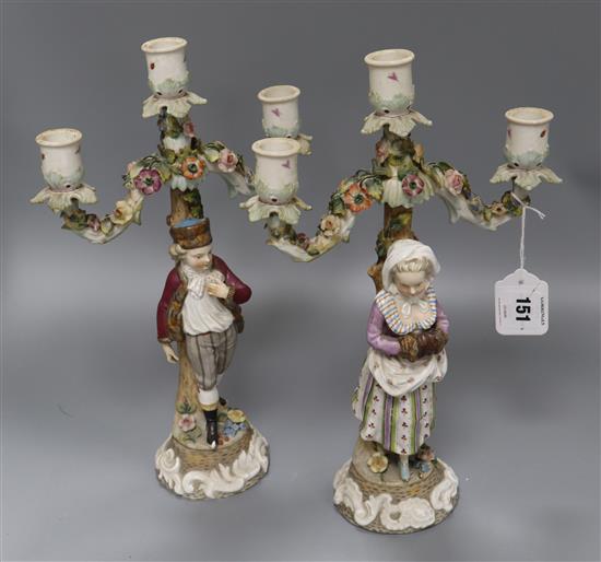 A pair of Continental porcelain candelabra height 36cm